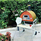 Pizza Party 70x70 wood-fired oven with wheeled aluminum stand and garden shovel